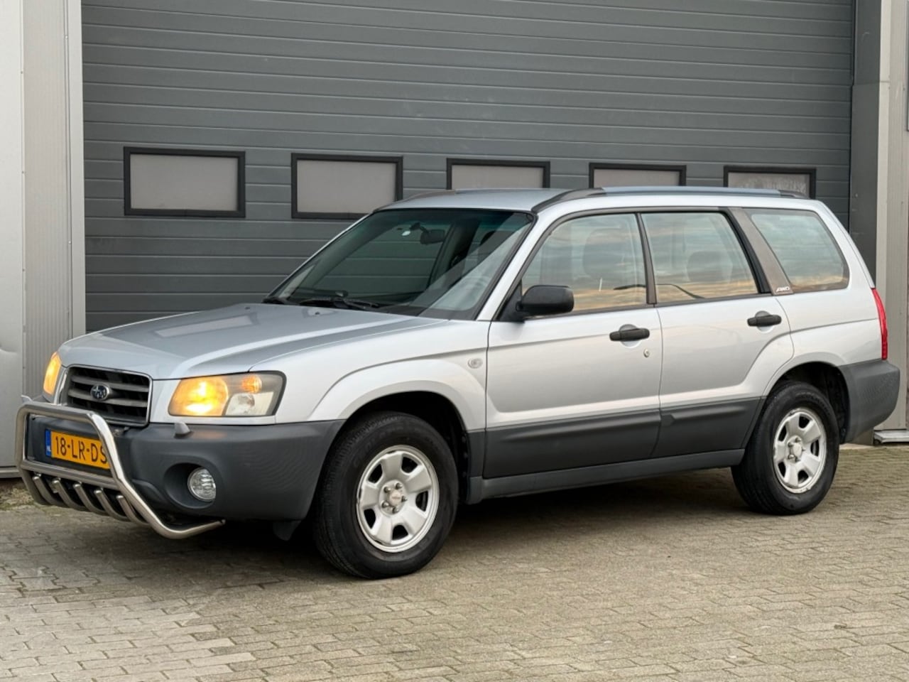 Subaru Forester - 2.0 AWD 125PK X Airco Cruise Trekhaak Bullbar! - AutoWereld.nl