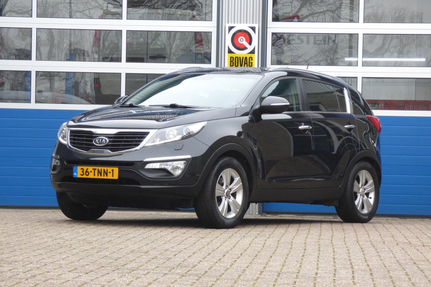 Kia Sportage - 1.6 GDI ISG X-clusive 1.6 GDI ISG X-clusive - AutoWereld.nl