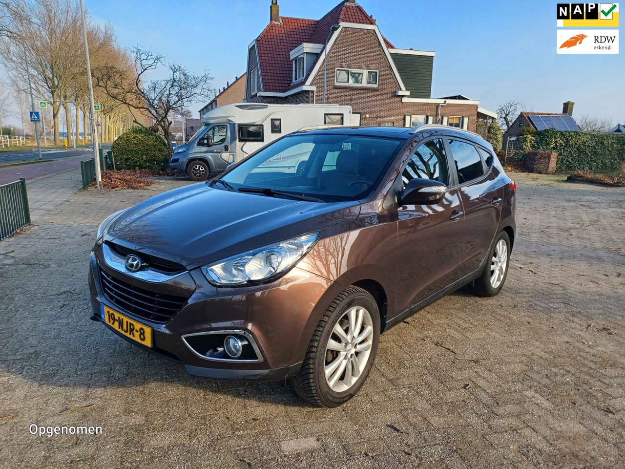 Hyundai ix35 - 2.0i i-Catcher automaat/leer/pano/navi/ - AutoWereld.nl