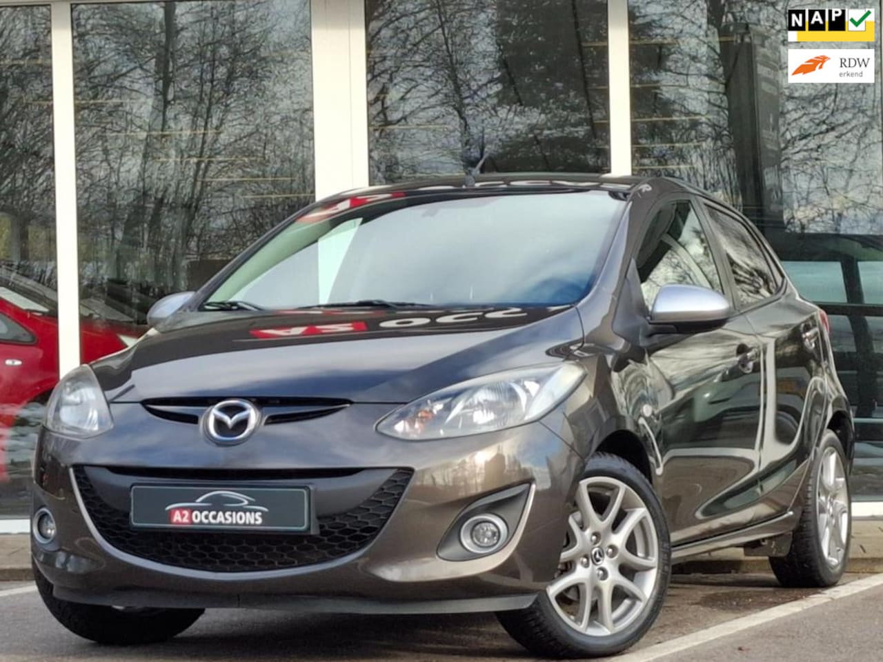 Mazda 2 - 1.3 Silver Edition Bluetooth/PDC/All seasons/Climate - AutoWereld.nl