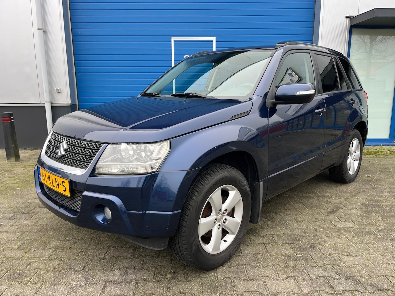 Suzuki Grand Vitara - 2.4 169pk Exclusive / 4 x 4 / Airco/climate / Cruise Control / Trekhaak / volledig bijgeho - AutoWereld.nl