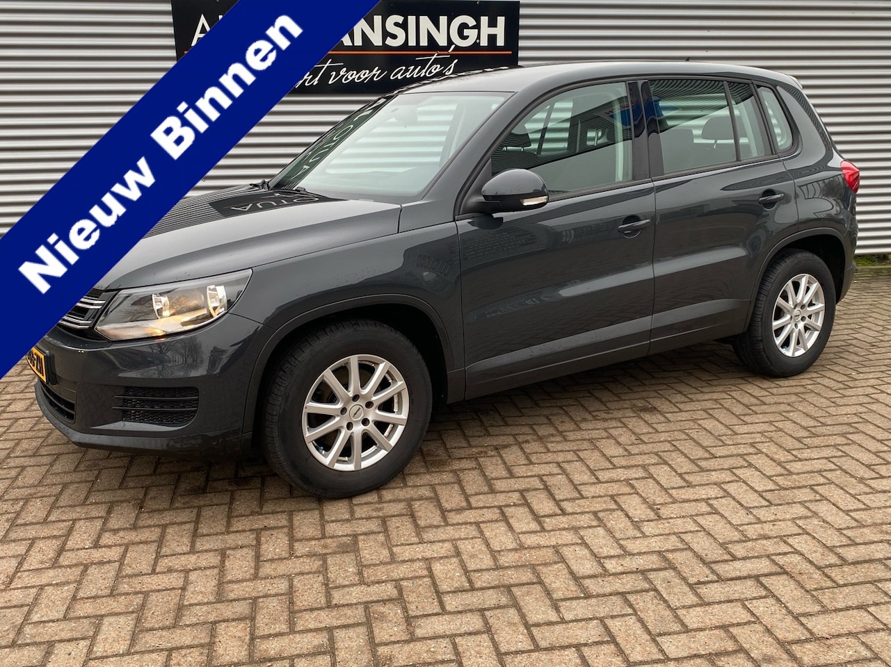 Volkswagen Tiguan - 1.4 TSI Easyline | Trekhaak | Navigatie | Airco | Chiptune! | LM Velgen | RIJKLAARPRIJS IN - AutoWereld.nl