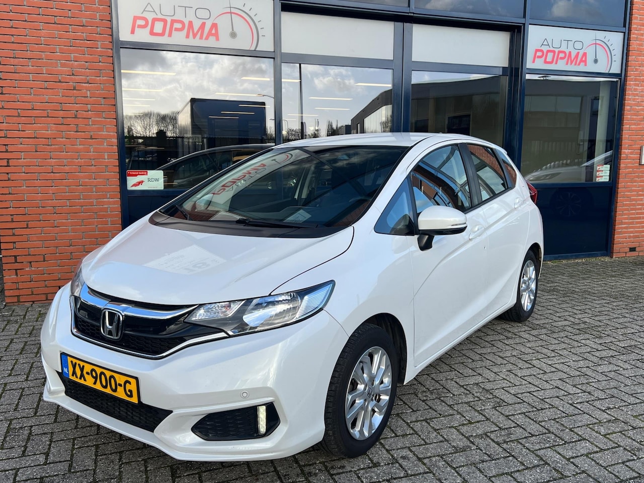 Honda Jazz - 1.3 i-VTEC 102pk Comfort Automaat / Airco / Cruise control / Trekhaak / Navigatie / Hoge i - AutoWereld.nl