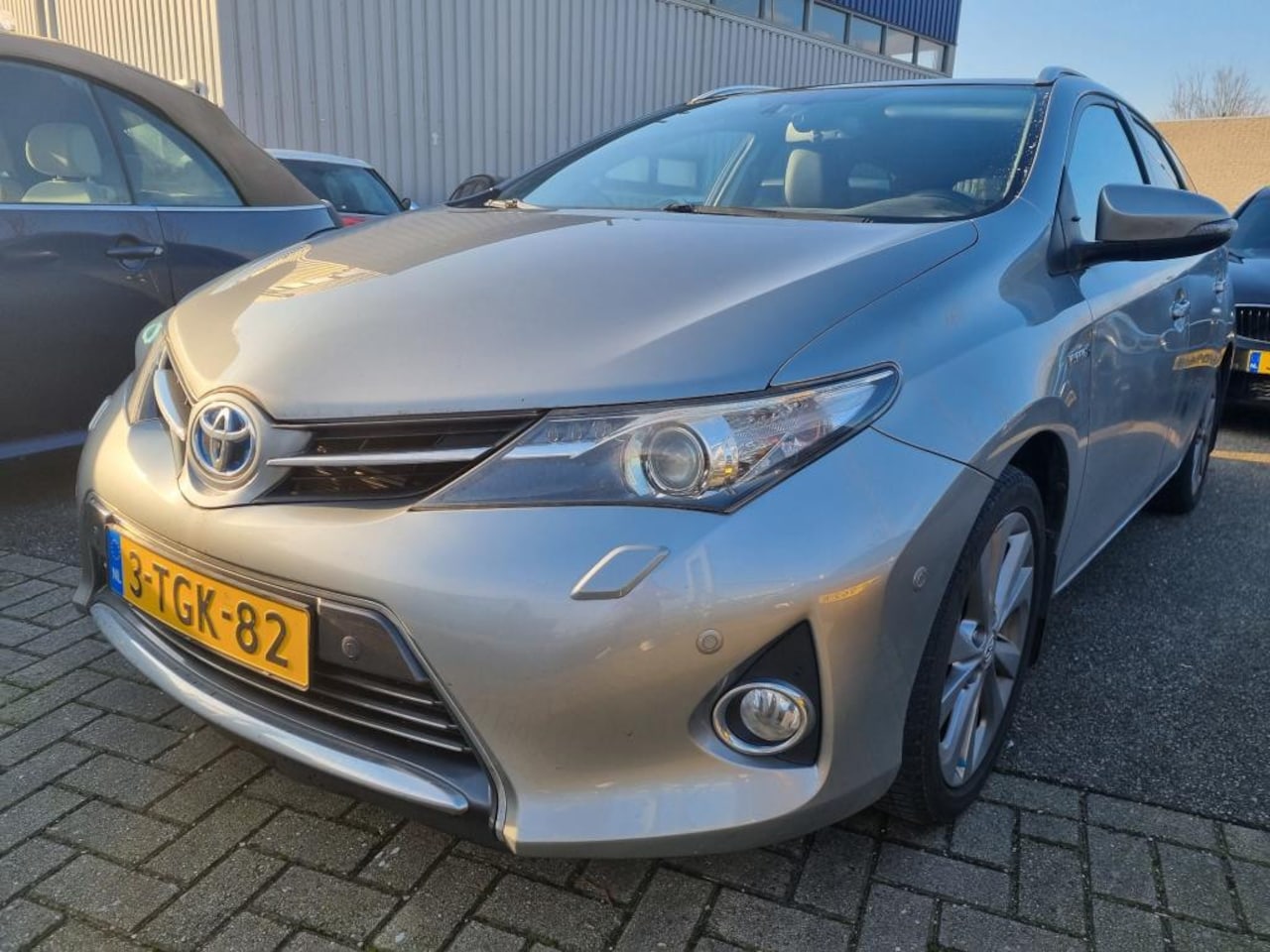 Toyota Auris Touring Sports - 1.8 Hybrid Panodak Leder Navi - AutoWereld.nl