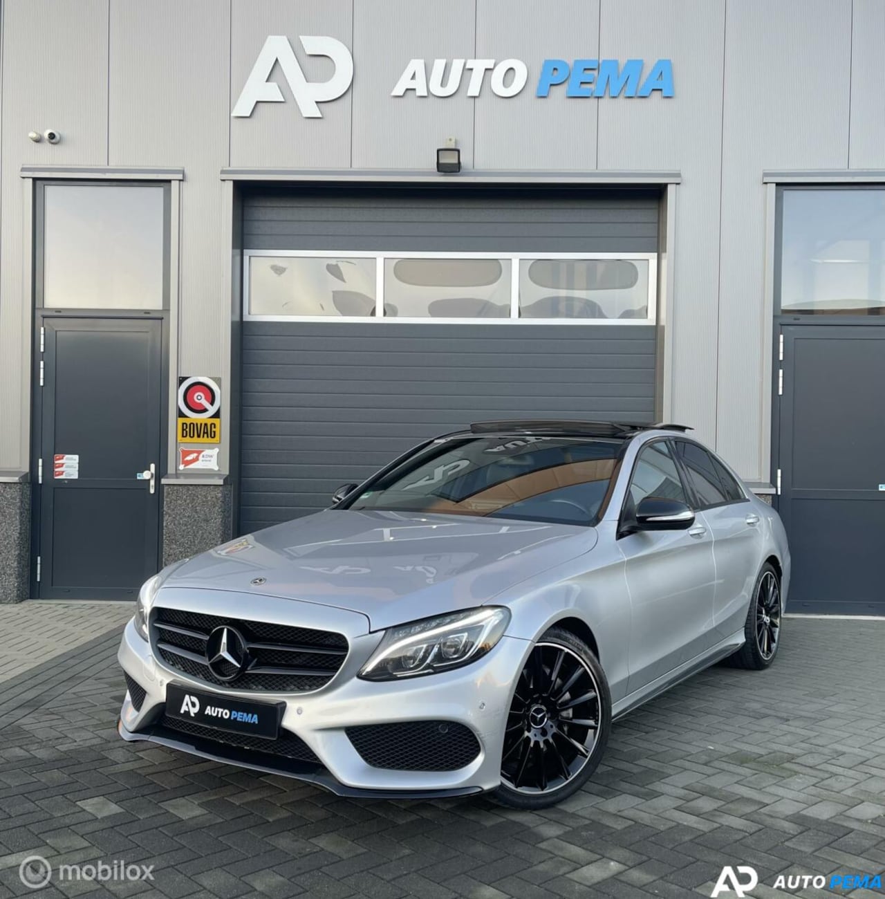 Mercedes-Benz C-klasse - Mercedes-Benz C-Klasse 200 AMG Line 184PK/LEDER/APP - AutoWereld.nl