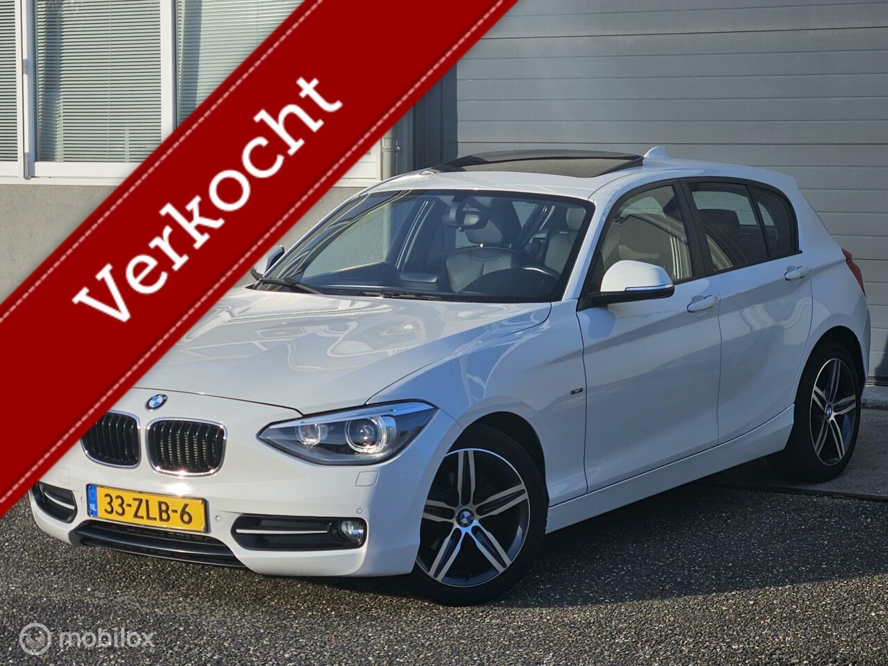 BMW 1-serie - 116i Sport Schuifdak Stoel verwarm Navi Airco NAP - AutoWereld.nl