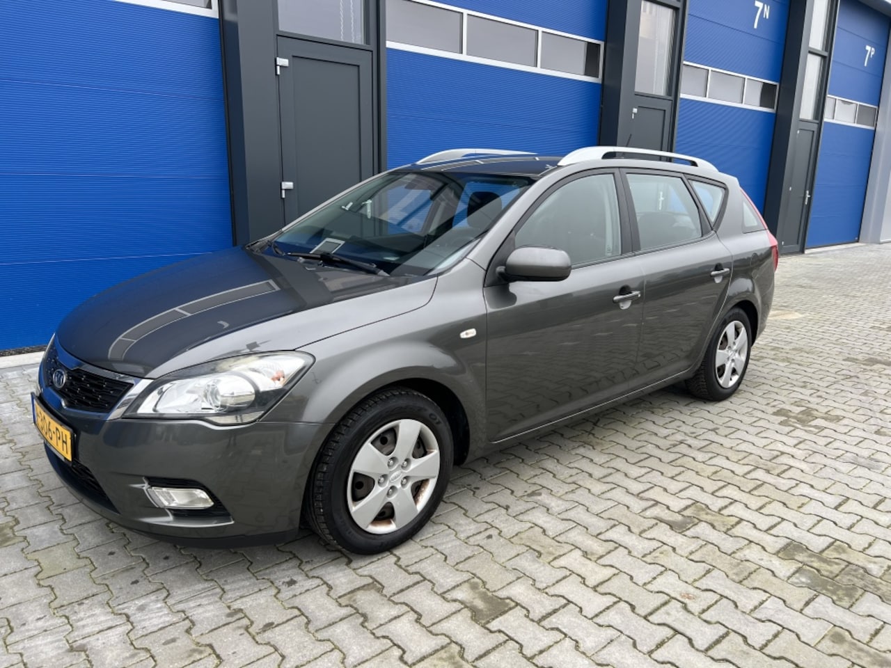 Kia Cee'd Sporty Wagon - 1.4 CVVT X-pect 1.4 CVVT X-pect - AutoWereld.nl