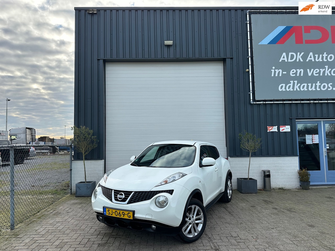 Nissan Juke - 1.6 Acenta CAMERA/NAVI/CRUISE/CLIMA/TREKHAAK - AutoWereld.nl