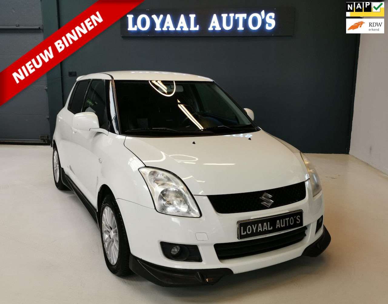 Suzuki Swift - 1.3 Shogun Parelmoer | NAVI | AIRCO | LEDER | NAP | APK. - AutoWereld.nl