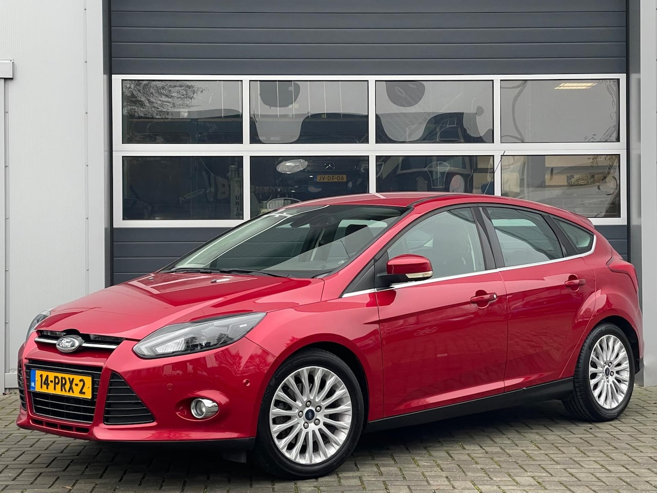 Ford Focus - 1.6 150pk EcoBoost First Edition | Navi | Xenon | PDC v+a | Half leder | Trekhaak - AutoWereld.nl