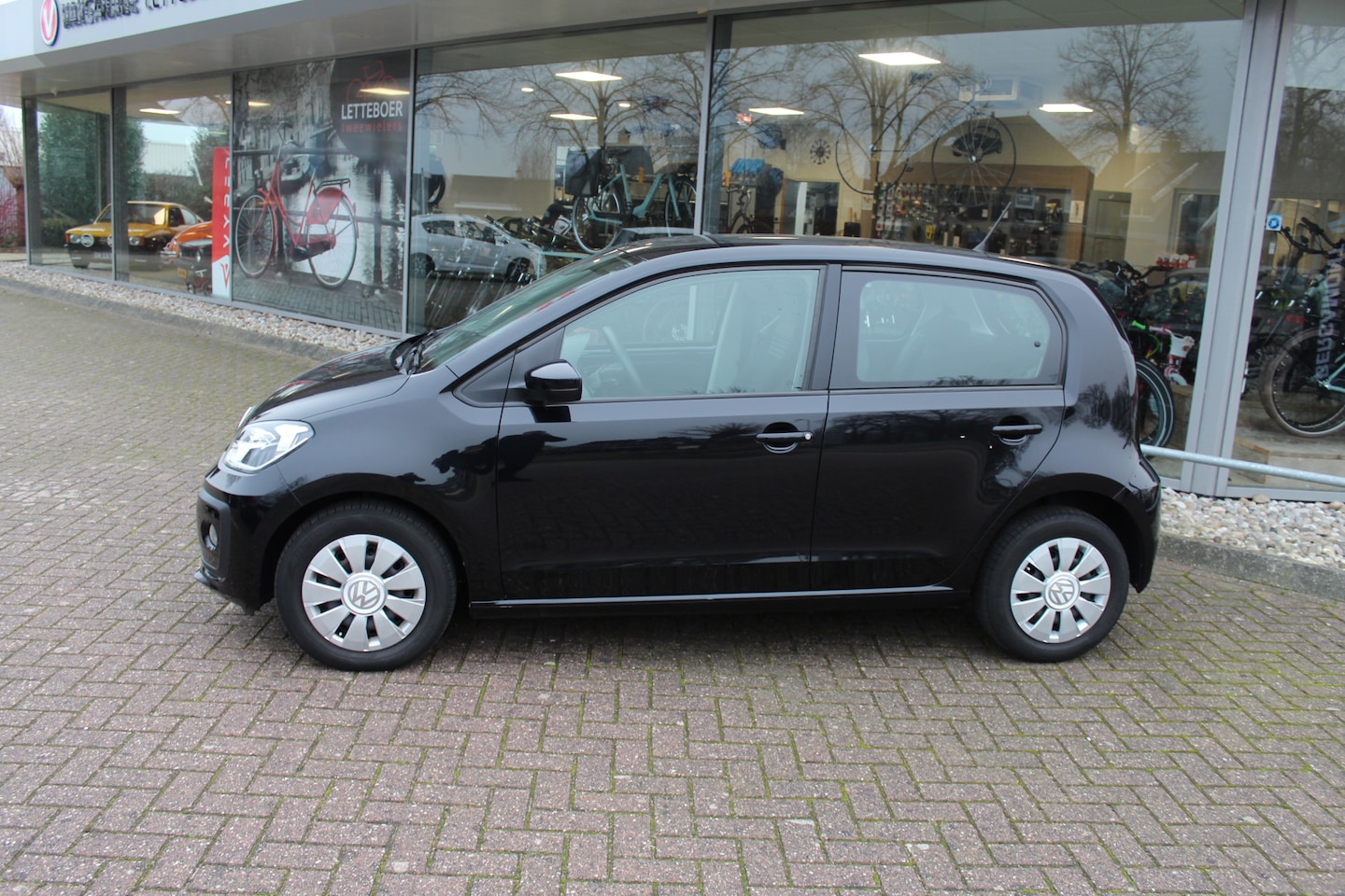 Volkswagen Up! - 1.0 BMT high up! | Clima | Stoelverwarming | - AutoWereld.nl