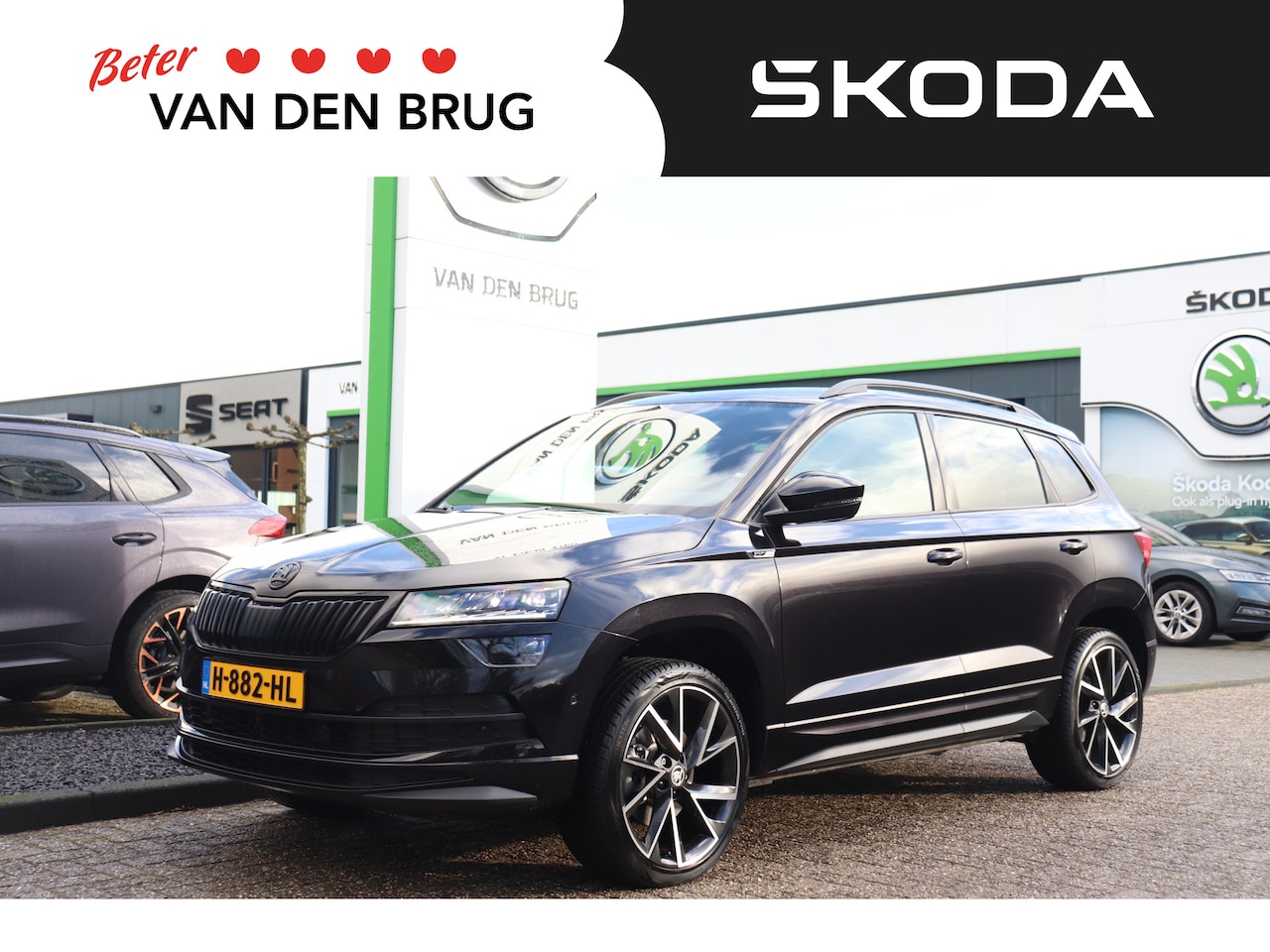 Skoda Karoq - 1.5 TSI 150pk AUTOMAAT Sportline Business | Panoramadak | Lederen bekleding | Elektrische - AutoWereld.nl