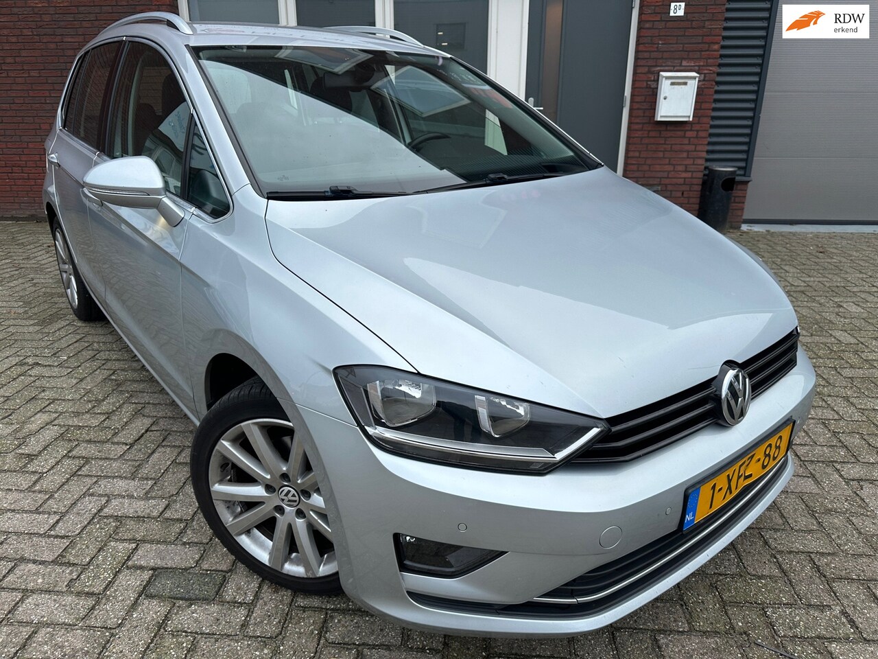 Volkswagen Golf Sportsvan - 1.2 TSI Highline / DSG / PDC / Cruise / NAP - AutoWereld.nl