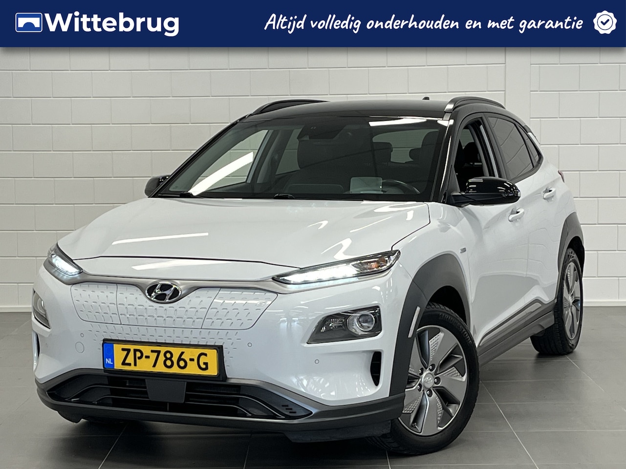 Hyundai Kona Electric - EV Premium 64 kWh LEDER | NAVIGATIE | FULL LED | TREKHAAK | TWO TONE | LONG RANGE - AutoWereld.nl