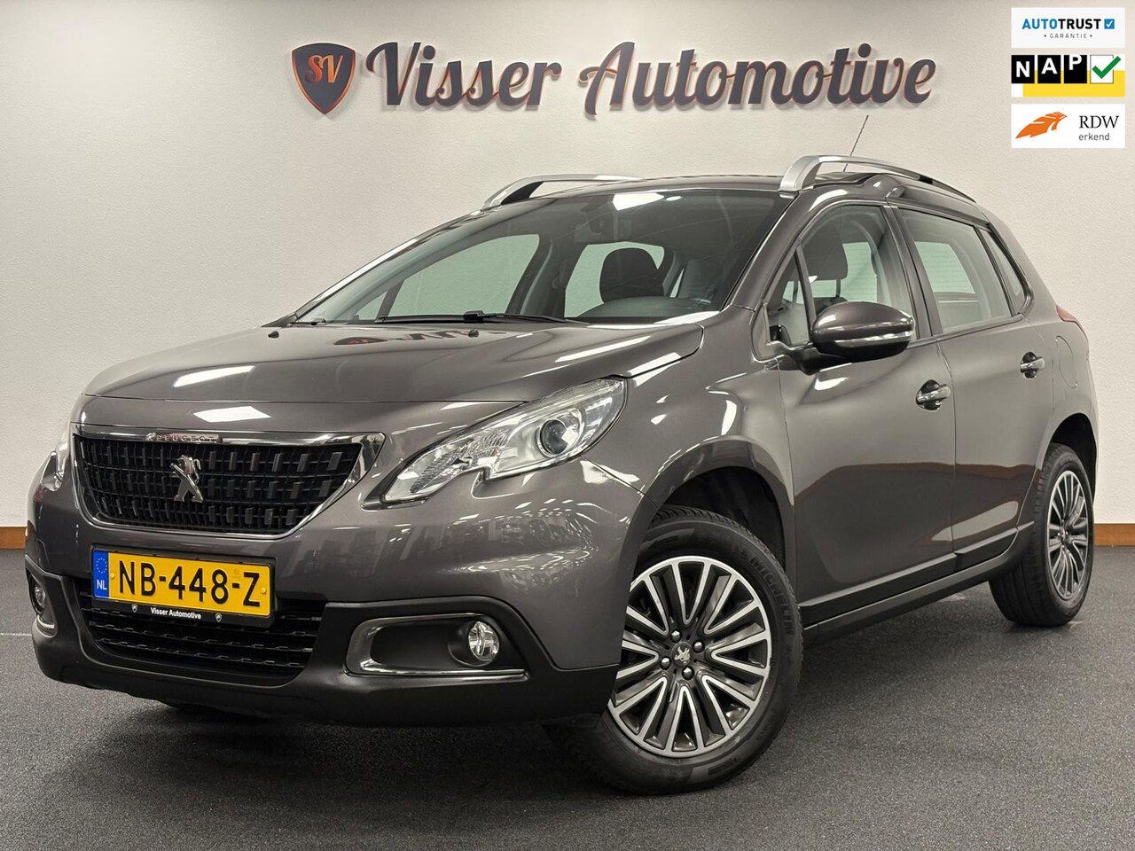 Peugeot 2008 - 1.2 PureTech Blue Lion*Nederlandse Auto*NAP*Cruise-Control*Navi*Trekhaak*PDC* - AutoWereld.nl