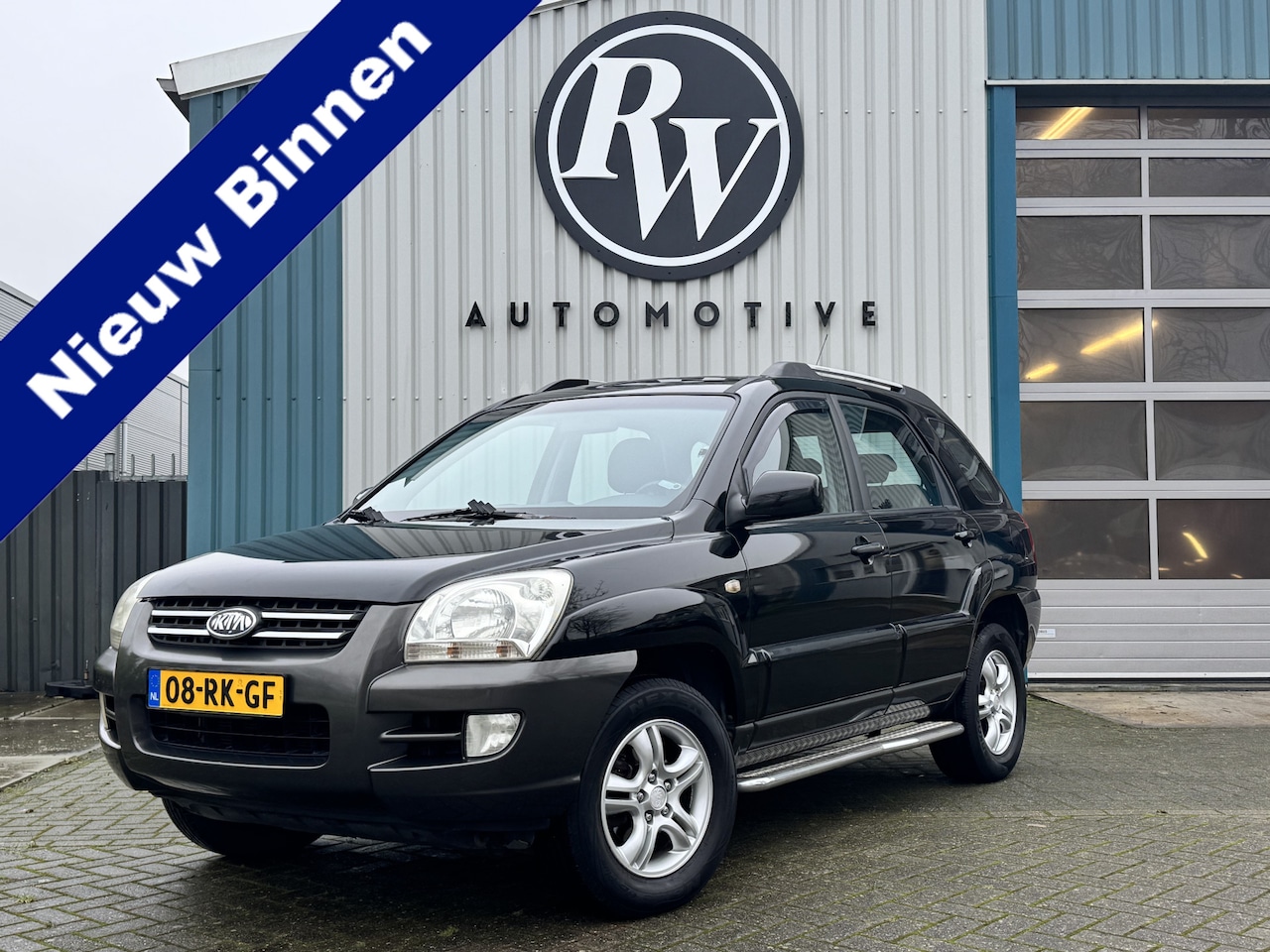 Kia Sportage - 2.0 CVVT Comfort Cruise / Airco / Sidebars / NL Auto / Trekhaak - AutoWereld.nl