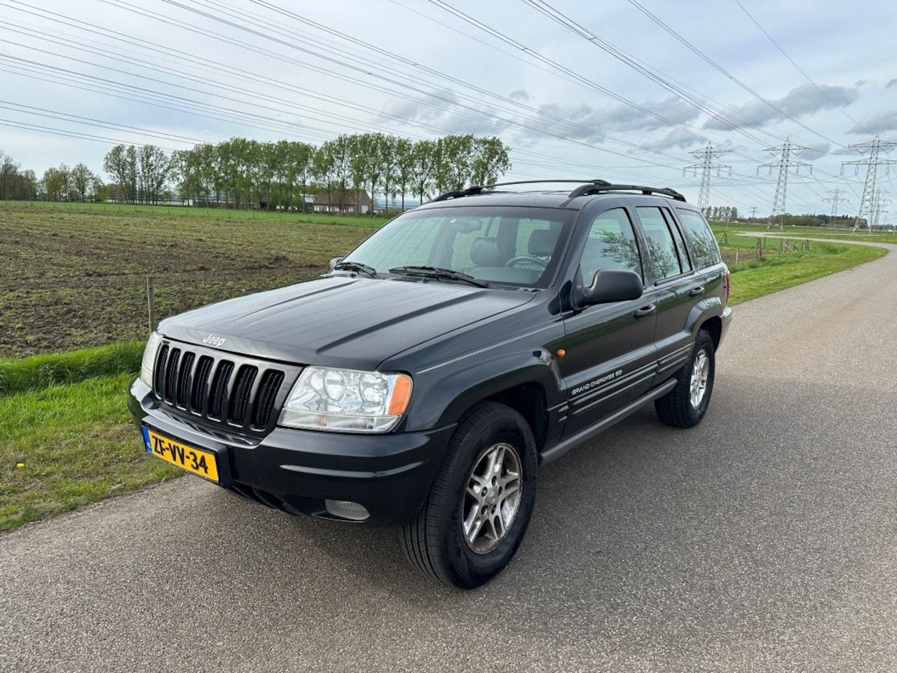 Jeep Grand Cherokee - 4.7i V8 Limited 4.7i V8 Limited - AutoWereld.nl