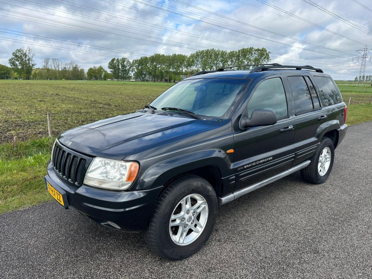 Jeep Grand Cherokee - 4.7i V8 Limited 4.7i V8 Limited - AutoWereld.nl