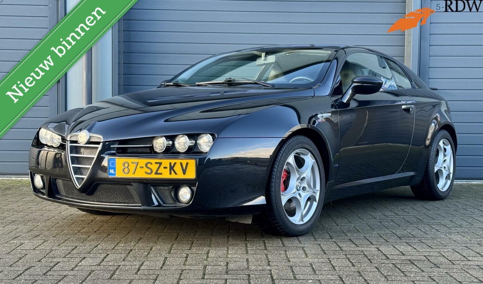 Alfa Romeo Brera - 2.2 JTS 185pk SkyWindow | NIEUWSTAAT | Uniek | Panoramadak | Org. NL | Perfect onderhouden - AutoWereld.nl