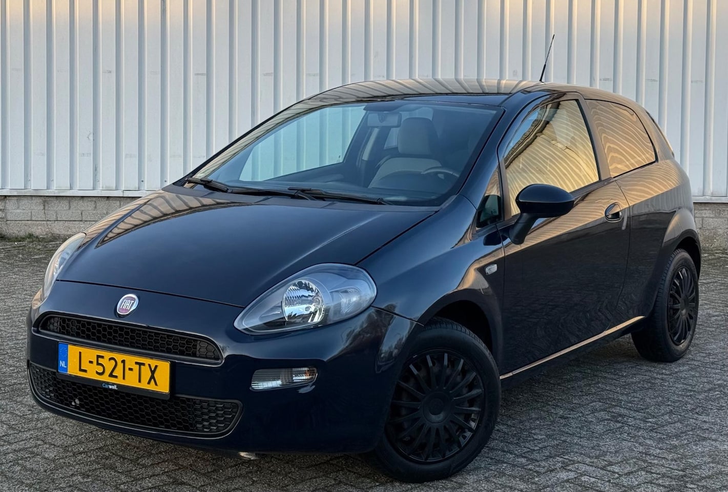 Fiat Punto Evo - 1.2 Pop Nette auto - AutoWereld.nl