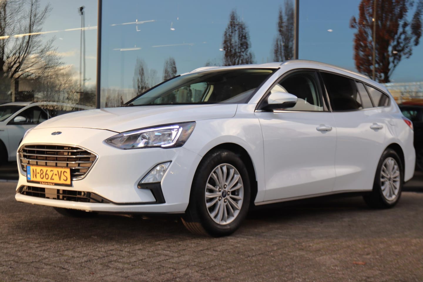 Ford Focus Wagon - 1.0 ECOBOOST AUT. TITANIUM X BUSINESS | LED | TREKHAAK | CARPLAY | KEY-LESS | NAVI | CRUIS - AutoWereld.nl