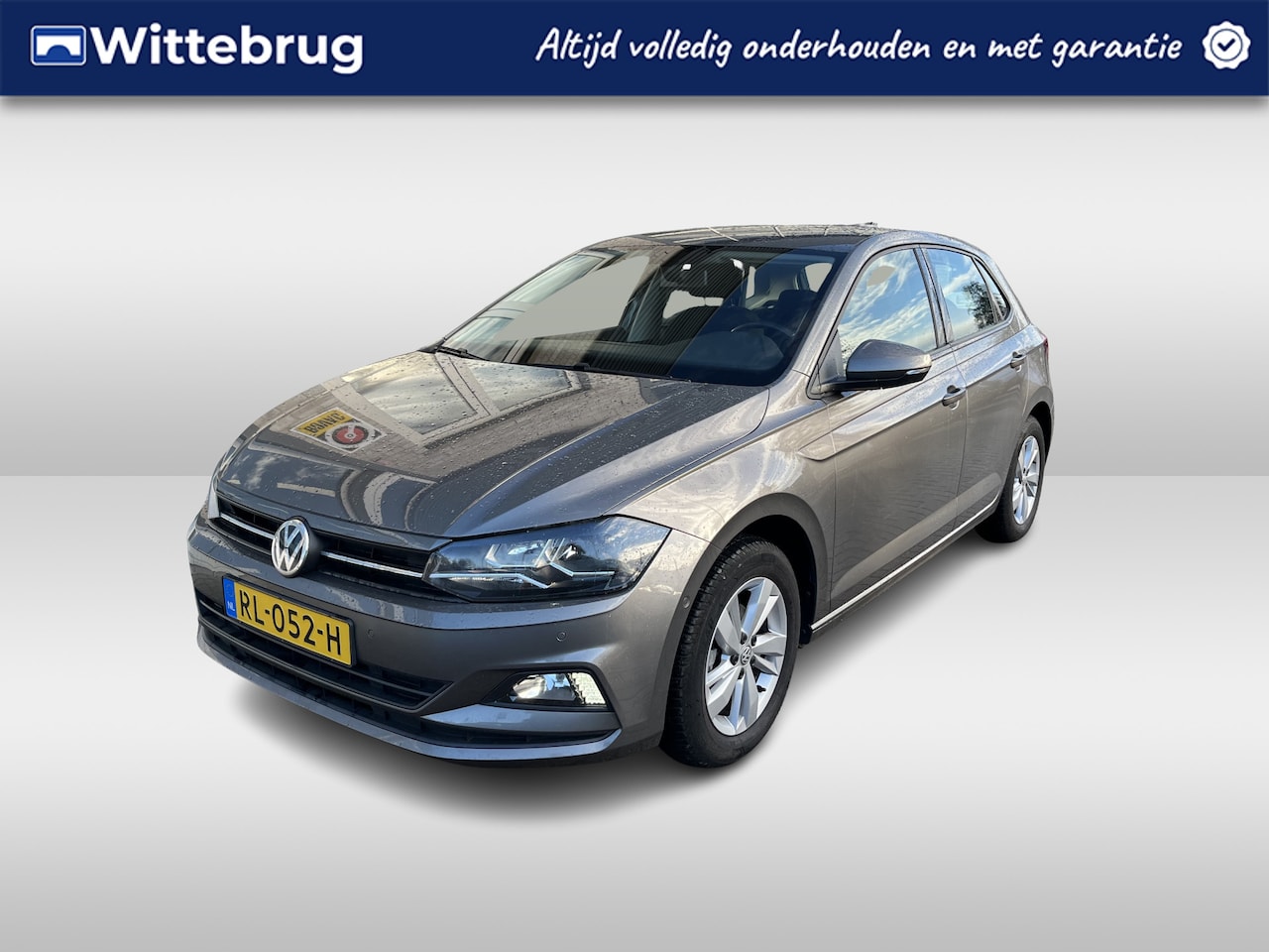 Volkswagen Polo - 1.0 TSI Comfortline / AUTOMAAT/ TREKHAAK/ PARK. SENSOREN/ DODE HOEK/ ADAPT. CRUISE/ APP-CO - AutoWereld.nl