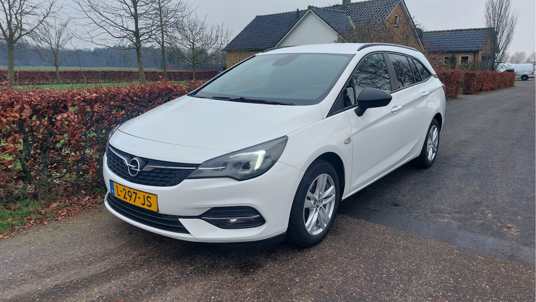 Opel Astra Sports Tourer - 1.2 Business Edition AIRCO/NAVI BJ 2021 - AutoWereld.nl