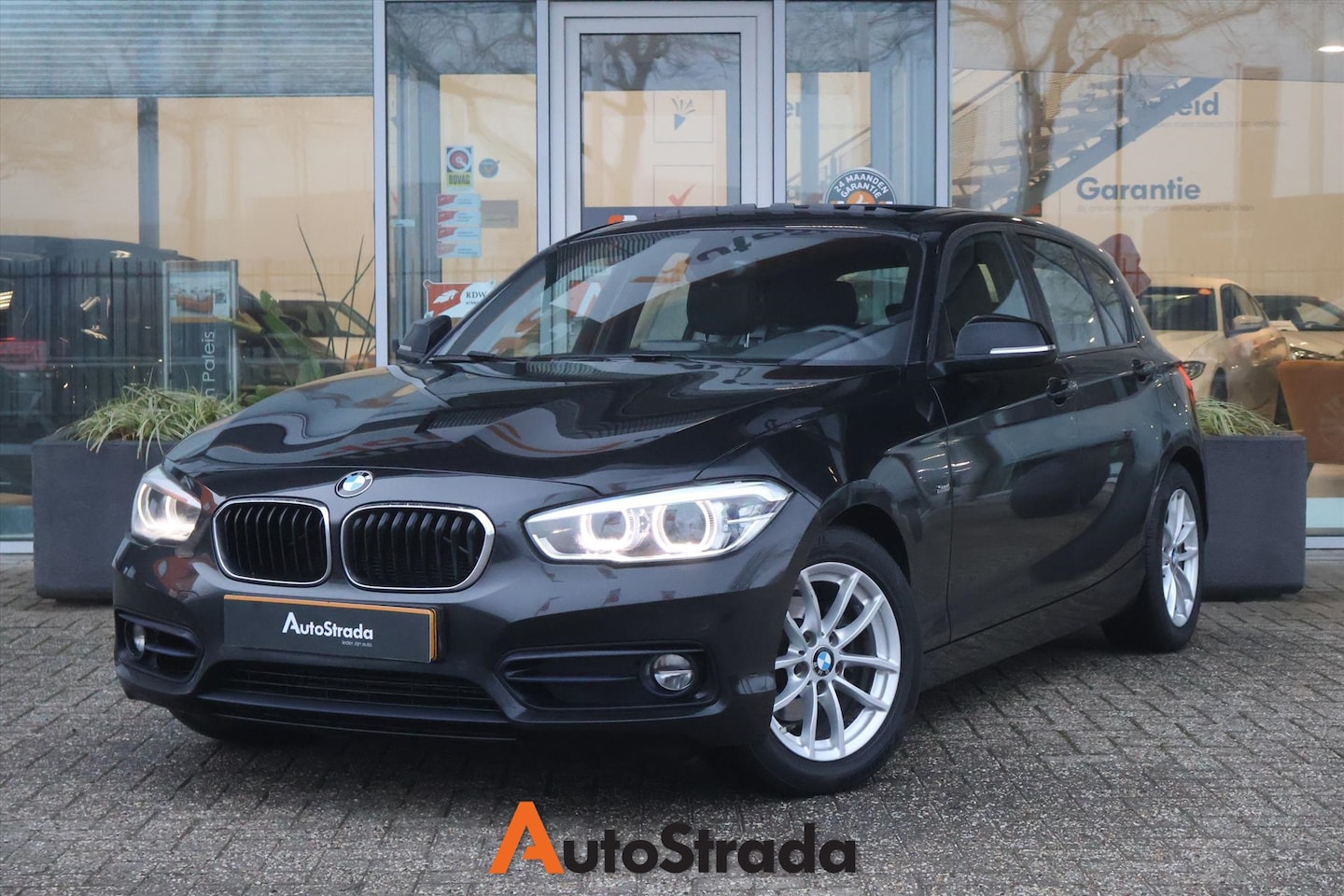 BMW 1-serie - (f20) 118i SportLine 136pk AUT I Navi I Climate I LED I Pano I Cruise - AutoWereld.nl