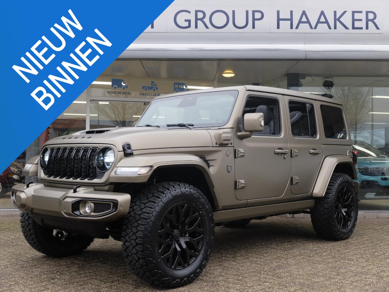 Jeep Wrangler Unlimited - 4xe 380 Sahara BRUTE CUSTOM I Plug In Hybrid I Mat Bronze - AutoWereld.nl