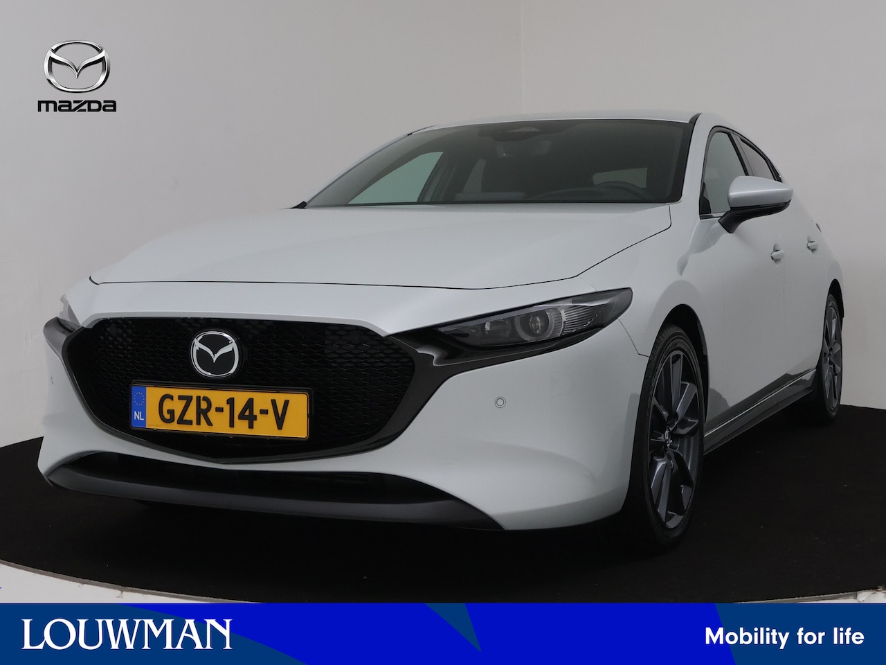 Mazda 3 - 2.5 e-SkyActiv-G M Hybrid 140 Takumi DEMO | Navigatie | Voorstoelen verwarmd | Stuurwiel v - AutoWereld.nl