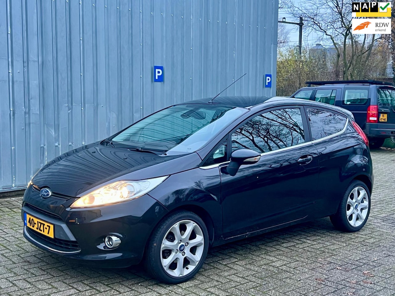 Ford Fiesta - 1.6 Titanium / Clima + Cruise / Stoelverw / 3drs - AutoWereld.nl