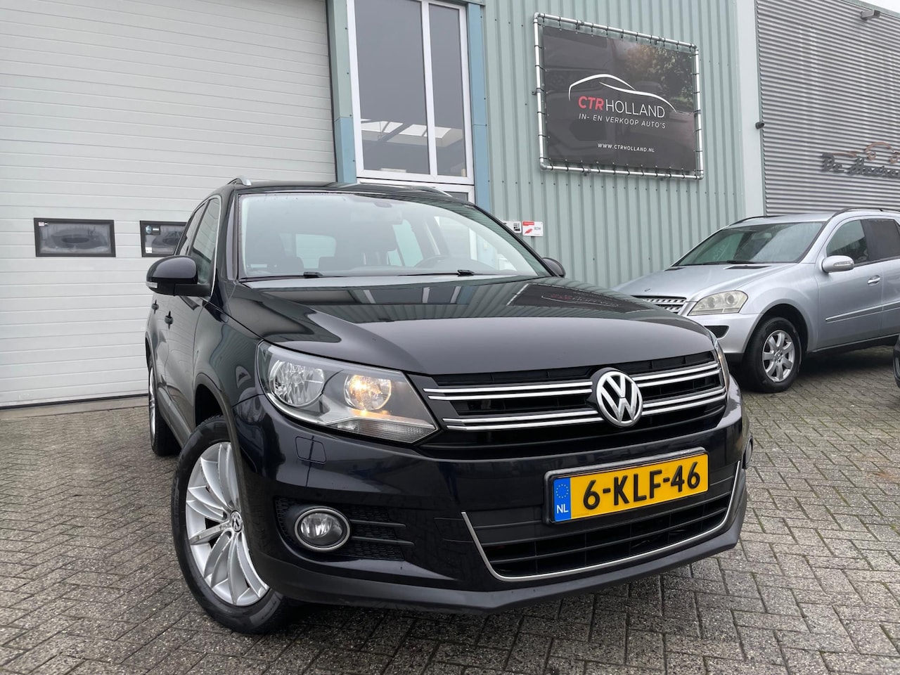 Volkswagen Tiguan - 2.0 TDI 103KW Sport&Style (bj 2012) FACELIFT|CLIMA|ALCANTARA|PDC|NAVI - AutoWereld.nl