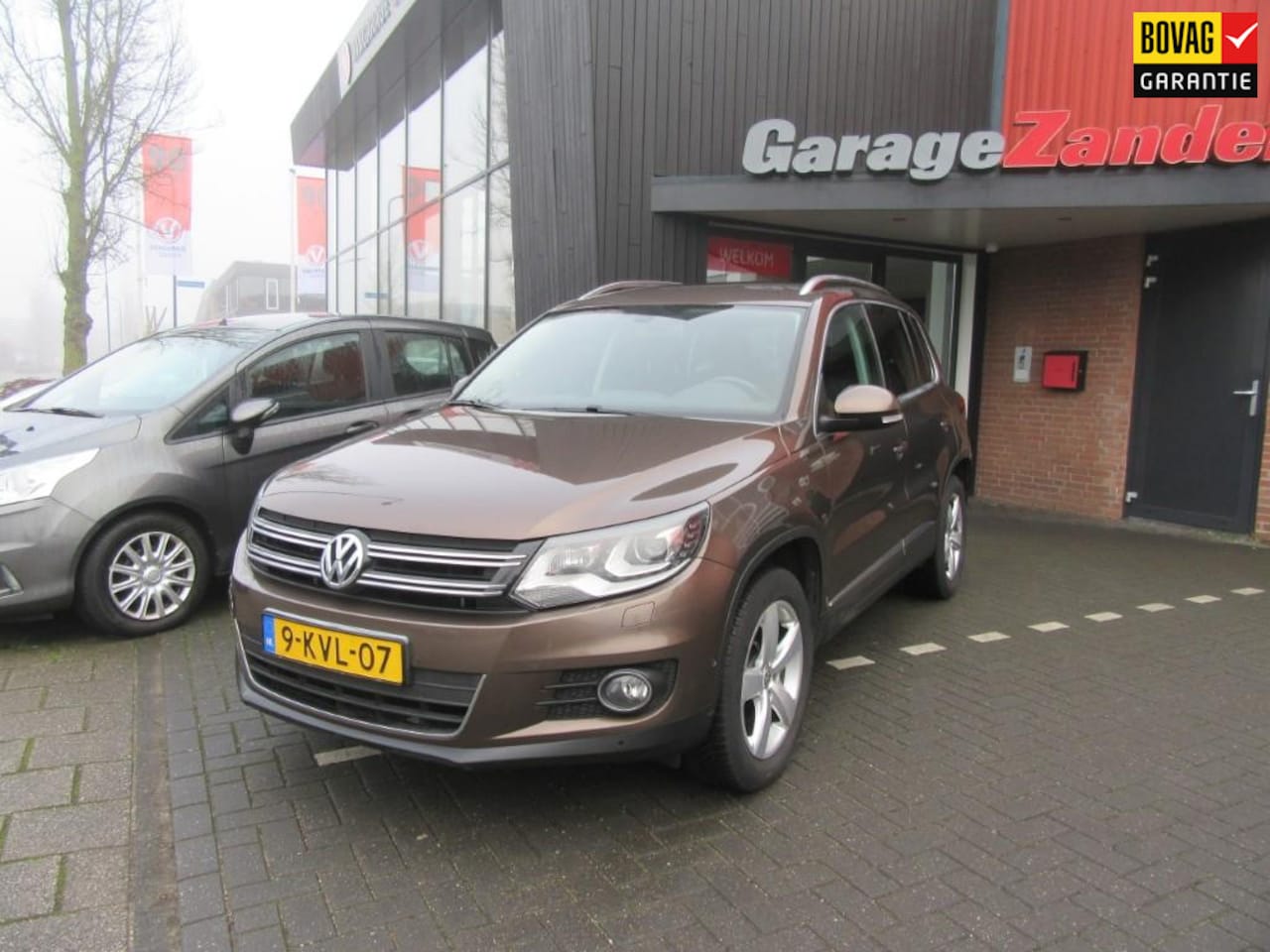 Volkswagen Tiguan - 1.4 TSI Sport&Style - AutoWereld.nl