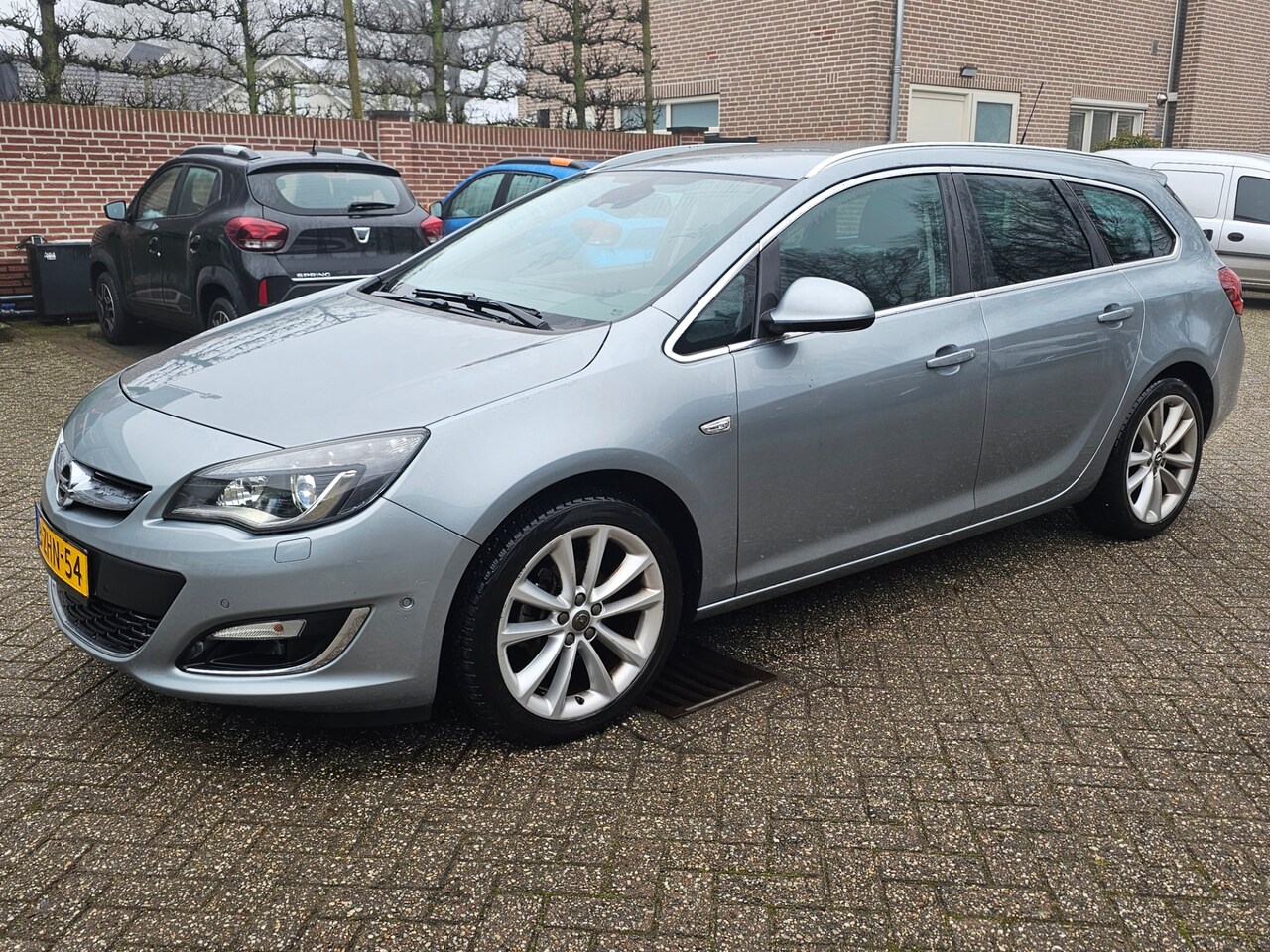 Opel Astra Sports Tourer - 1.4 Turbo Sport + Leer/Pdc - AutoWereld.nl