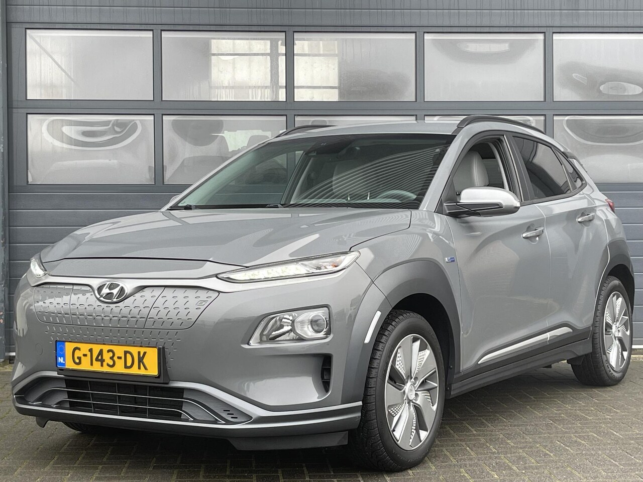 Hyundai Kona Electric - EV FASHION 64 KWH I APPLE/ANDROID I PARKEERCAMERA I CLIMATE CONTROL I CRUISE CONTROL - AutoWereld.nl