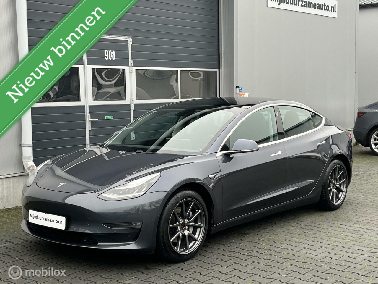 Tesla Model 3 - Long Range RWD Long Range AWD 75 kWh - Trekhaak - Nette auto! - AutoWereld.nl