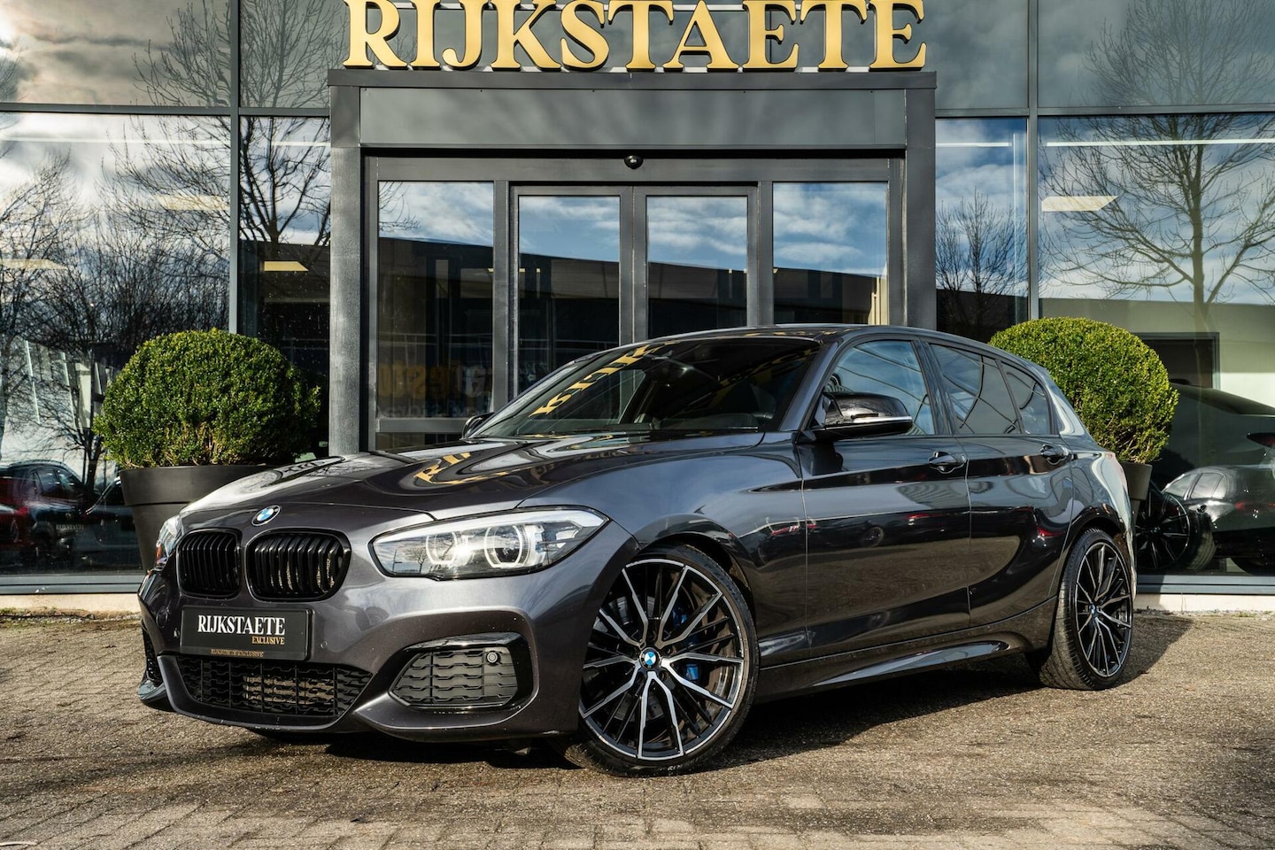 BMW 1-serie - M140i xDrive High Executive|H&K|REMUS|19'' - AutoWereld.nl