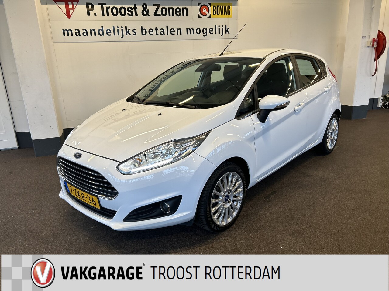 Ford Fiesta - 1.0 EcoBoost Titanium | Cruise control | Climate control | Navigatie | Bluetooth | Parkeer - AutoWereld.nl