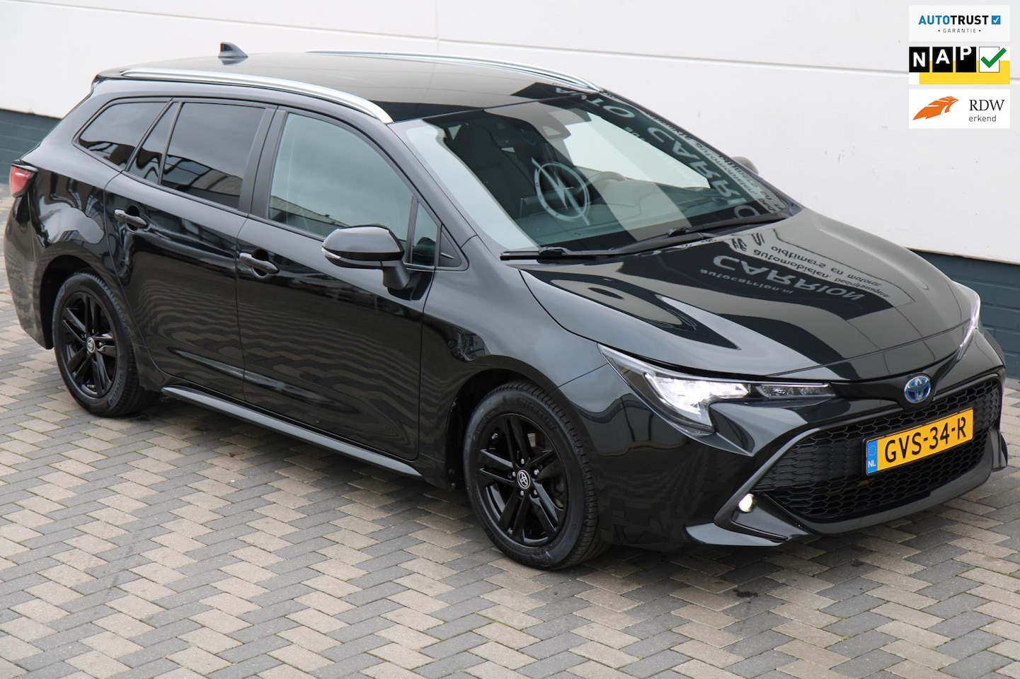 Toyota Corolla Touring Sports - 1.8 Hybrid Active Navi Cruise Carplay!! - AutoWereld.nl