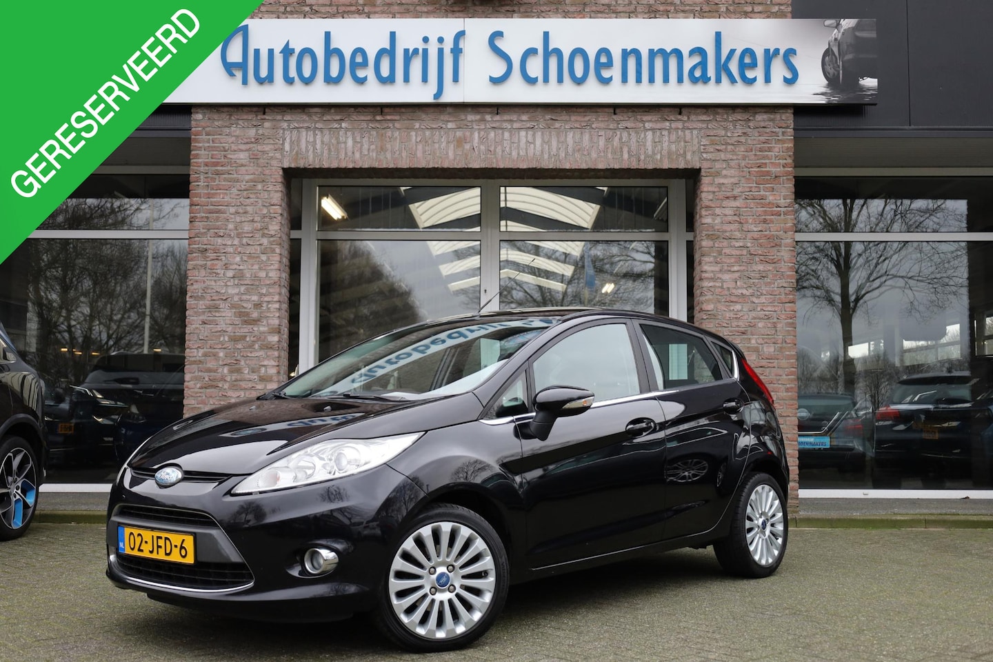 Ford Fiesta - 1.25 Titanium RUITVERWARMING CLIMA PDC 16"LMV NAP - AutoWereld.nl