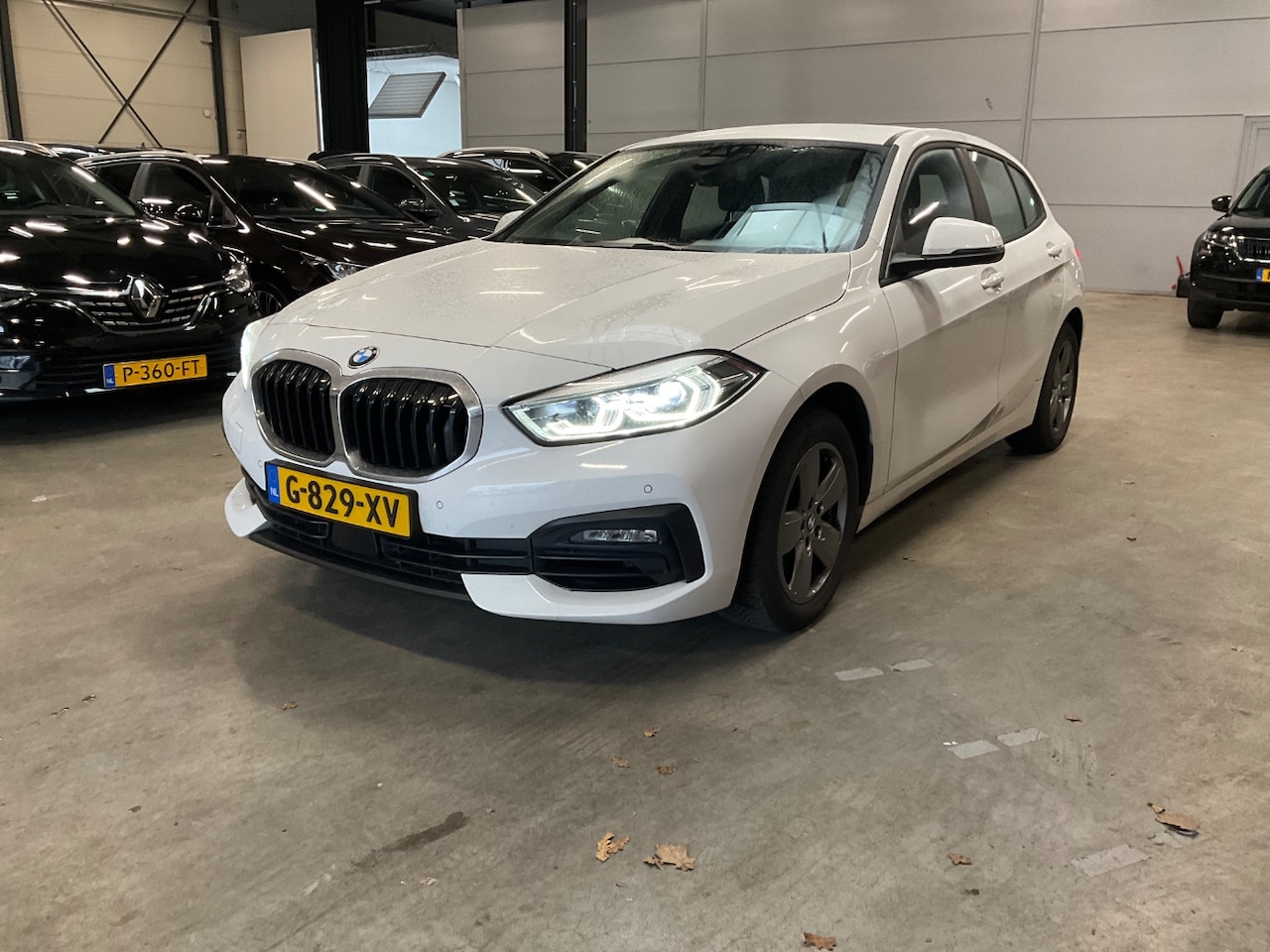 BMW 1-serie - 118i Executive Edition automaat | Navi | Carplay | Clima | Led | Cruise | Komt binnenkort - AutoWereld.nl