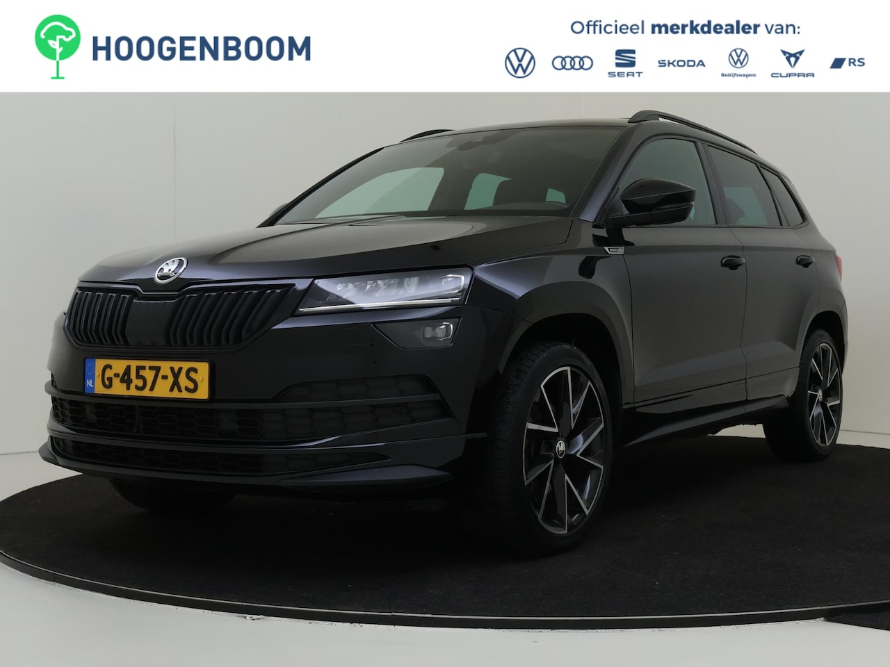 Skoda Karoq - 1.5 TSI ACT Sportline Business | Panoramadak | Trekhaak | Keyless | CANTON audio | Stoelve - AutoWereld.nl