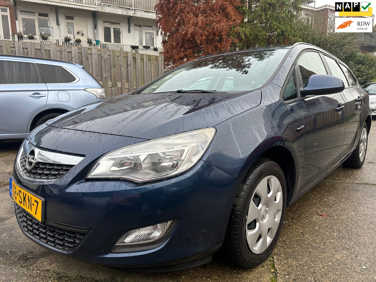 Opel Astra Sports Tourer - 1.4 Turbo Edition Clima Cruise NAVi Bluetooth - AutoWereld.nl