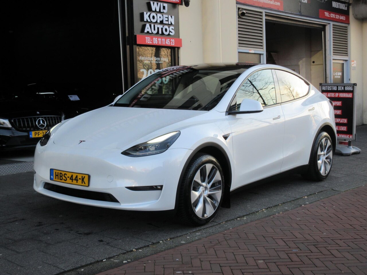 Tesla Model Y - Long Range AWD 75 kWh BTW Autopilot - AutoWereld.nl