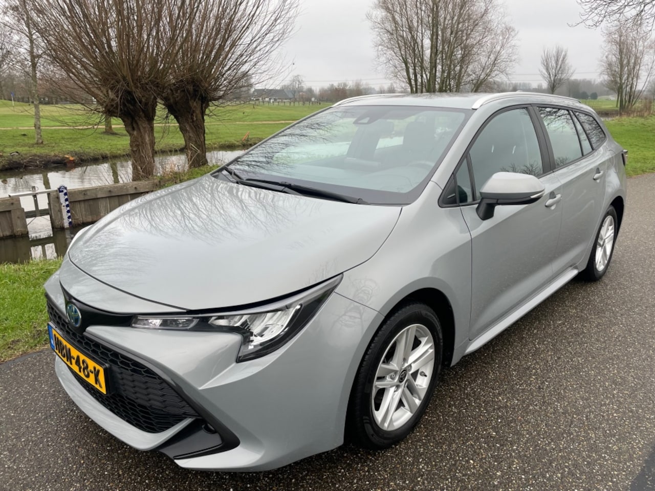 Toyota Corolla Touring Sports - Hybrid 140 Active navi/camera/ad.cruise/safety sense/all-in prij - AutoWereld.nl