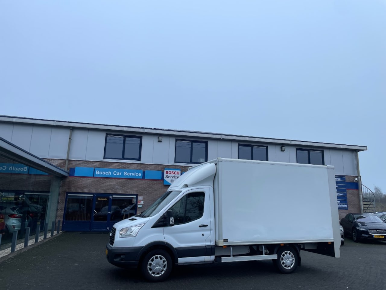 Ford Transit - 2.0 TDCI Aut | Meubelbak + Laadklep | Airco - AutoWereld.nl