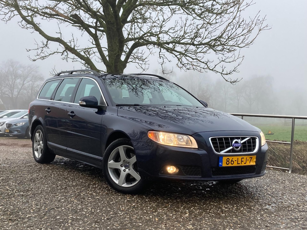 Volvo V70 - 2.0T Momentum | Dealer onderhoud | Leer + Navi + Stoelverw. nu €7.975,-!! - AutoWereld.nl