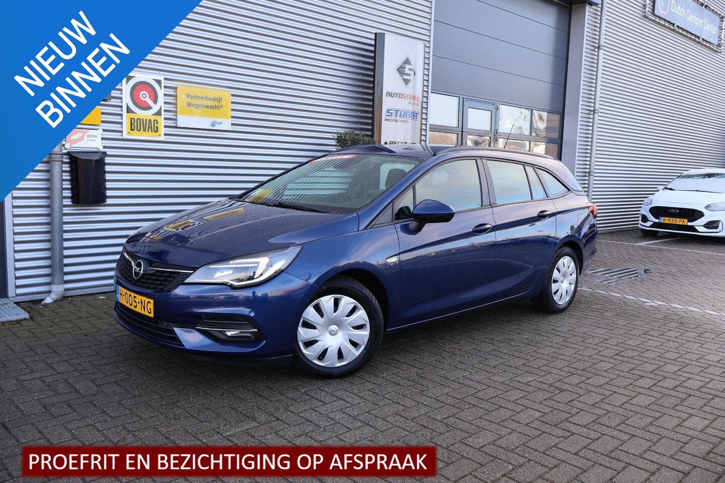 Opel Astra Sports Tourer - 1.2 Business Edition 130PK | Parkeersensoren Achter |Camera | Navi | Trekhaak | NL-Auto | - AutoWereld.nl