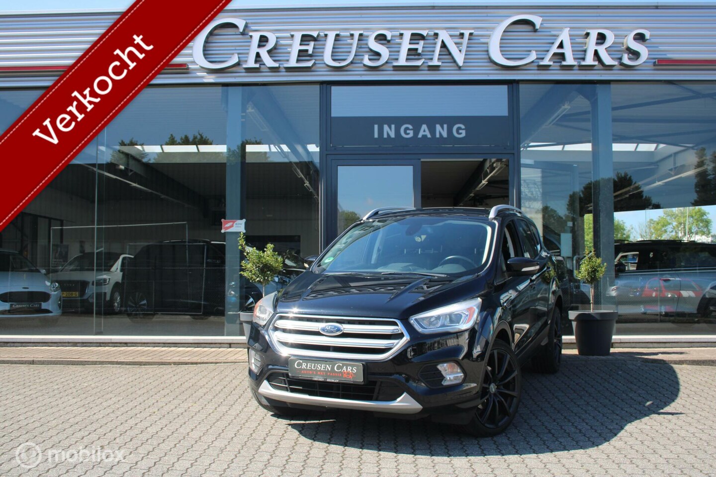 Ford Kuga - 1.5 EcoBoost Titanium/Navi/Tel/20"/Pdc/ - AutoWereld.nl