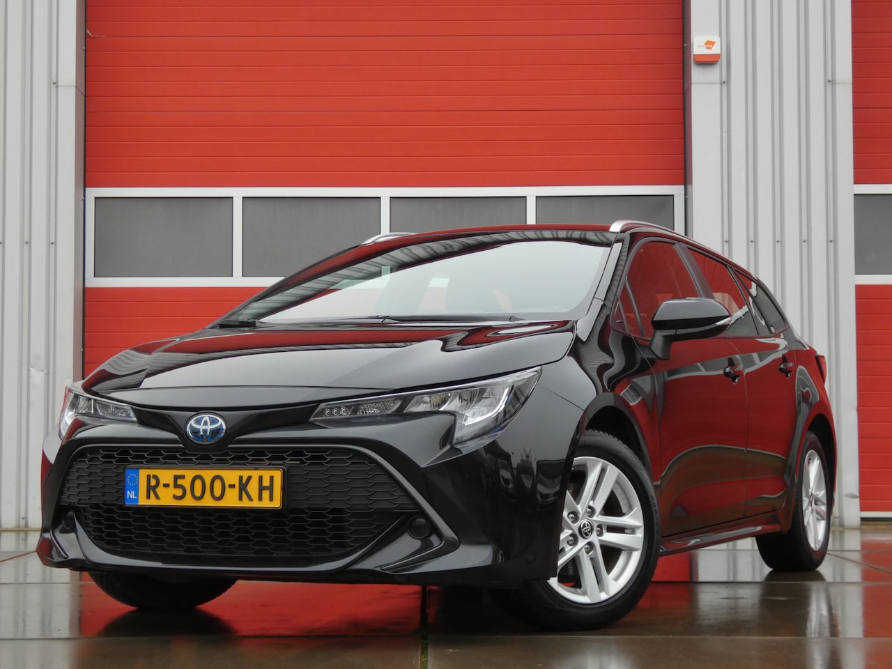 Toyota Corolla Touring Sports - 1.8 Hybrid Active/ lage km/ zeer mooi! - AutoWereld.nl